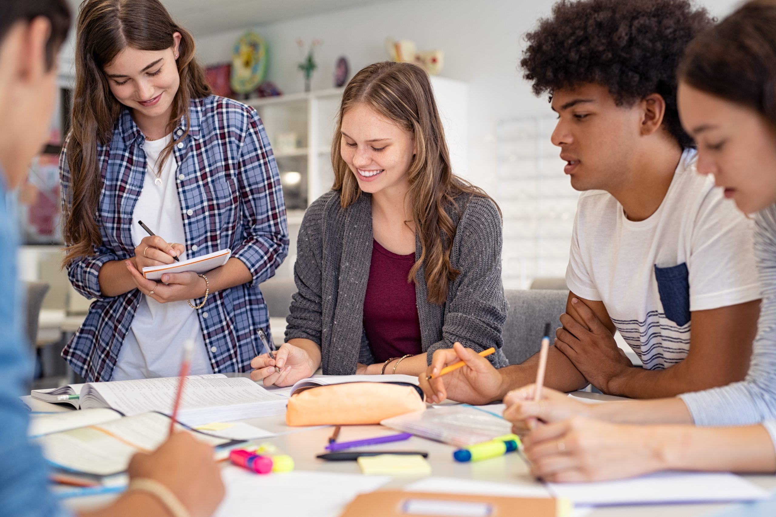 Group of college students studying